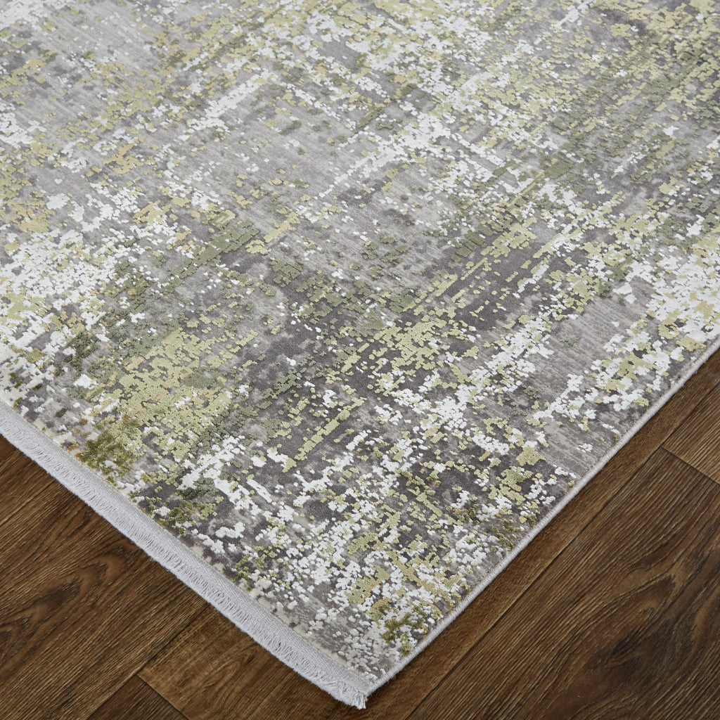 5' X 8' Green Gray And Ivory Abstract Area Rug With Fringe