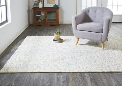 5' X 8' Ivory And Gray Wool Floral Tufted Handmade Stain Resistant Area Rug