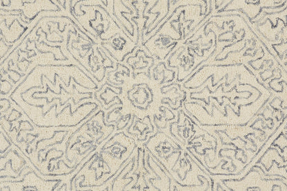 5' X 8' Ivory And Gray Wool Floral Tufted Handmade Stain Resistant Area Rug