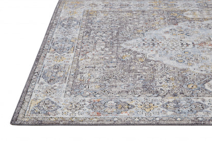 10' X 13' Gray Blue And Gold Floral Stain Resistant Area Rug