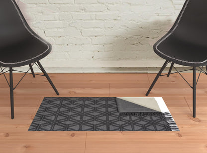 5' X 8' Black And Gray Wool Geometric Hand Woven Area Rug With Fringe