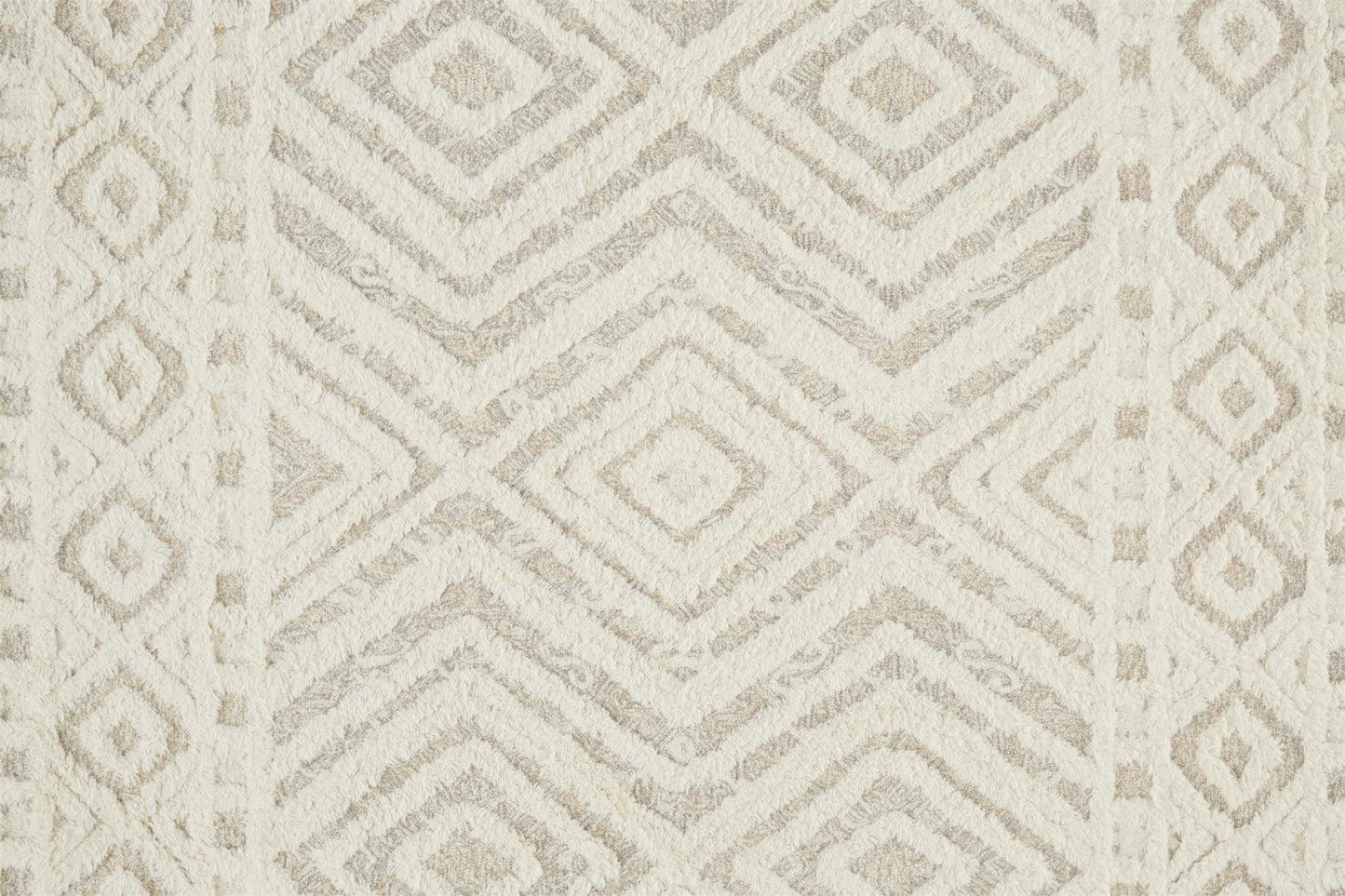 5' X 8' Ivory And Tan Wool Geometric Tufted Handmade Stain Resistant Area Rug