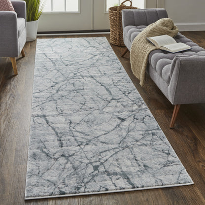 3' X 5' Blue Gray And Ivory Abstract Distressed Stain Resistant Area Rug